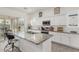 Bright kitchen featuring granite countertops, island and stainless steel appliances at 399 N 157Th Ln, Goodyear, AZ 85338