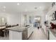 Bright kitchen featuring granite countertops, stainless steel appliances, and open layout at 399 N 157Th Ln, Goodyear, AZ 85338