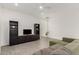 Spacious living room with hardwood floors, modern furniture, a ceiling fan, and plenty of natural light at 399 N 157Th Ln, Goodyear, AZ 85338
