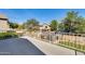 View from the rooftop deck of the backyard with custom landscaping and detached storage shed at 4050 W Camino Del Rio --, Glendale, AZ 85310