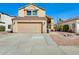 Charming two-story home featuring a spacious two-car garage, xeriscaping, and a well-maintained front yard at 4050 W Camino Del Rio --, Glendale, AZ 85310