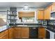 Kitchen featuring granite countertops, wood cabinets, and stainless steel appliances and fixtures at 4050 W Camino Del Rio --, Glendale, AZ 85310