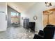 Bright living room featuring vaulted ceiling, modern decor, and large windows, offering plenty of natural light at 4050 W Camino Del Rio --, Glendale, AZ 85310