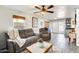 Comfortable living room with gray furniture and a view of the patio at 4050 W Camino Del Rio --, Glendale, AZ 85310