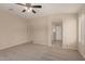 View of primary bedroom showcasing neutral tones, walk-in closet, and private bath at 4176 E Bonanza Rd, Gilbert, AZ 85297