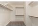 Large walk-in closet with shelving and rods for optimal storage at 4176 E Bonanza Rd, Gilbert, AZ 85297