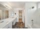 Bright bathroom with dual sinks, spacious vanity, and a shower-tub combo at 4310 E Palo Brea Ln, Cave Creek, AZ 85331