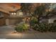 Charming two-story home with a desert landscaped front yard, attached garage, and tile roof at 4310 E Palo Brea Ln, Cave Creek, AZ 85331