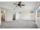 Large main bedroom offering generous space, carpet flooring, and an ensuite bathroom at 4310 E Palo Brea Ln, Cave Creek, AZ 85331