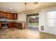 This kitchen features wood cabinets, stainless steel appliances, and direct access to the backyard at 4415 E High Point Dr, Cave Creek, AZ 85331