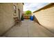 This side yard features hardscape, chair, and fence at 4415 E High Point Dr, Cave Creek, AZ 85331