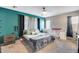 Bedroom features a queen sized bed, side tables, and crib at 44235 W Mcclelland Dr, Maricopa, AZ 85138