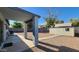 Covered patio and large backyard provides ample space for relaxing and entertaining at 444 W Fabens Ln, Gilbert, AZ 85233