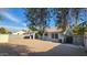 The home features a fully fenced backyard with easy-care gravel and covered patio at 444 W Fabens Ln, Gilbert, AZ 85233