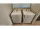Bright laundry room with side-by-side washer and dryer at 444 W Fabens Ln, Gilbert, AZ 85233