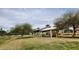 Shaded picnic area with playground and grass at 444 W Fabens Ln, Gilbert, AZ 85233