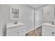 Well-lit bathroom with tile flooring and dual sinks, offers a clean and functional space at 4617 N 8Th Pl, Phoenix, AZ 85014