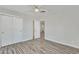 Bedroom with closet and ceiling fan featuring wood-look floors at 4617 N 8Th Pl, Phoenix, AZ 85014