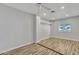 Bedroom featuring a wood-look tile floor and a white ceiling fan at 4617 N 8Th Pl, Phoenix, AZ 85014