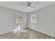 Bedroom with wood-look floors, neutral paint and a ceiling fan offers a cozy retreat at 4617 N 8Th Pl, Phoenix, AZ 85014