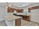 Modern kitchen featuring stone countertops, pendant lighting, and ample cabinet space for storage at 4617 N 8Th Pl, Phoenix, AZ 85014