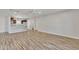 Spacious living room showcasing wood-look tile floors and abundant natural light at 4617 N 8Th Pl, Phoenix, AZ 85014