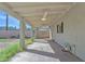 Covered patio area with ceiling fans and a view of the backyard and block wall at 4617 N 8Th Pl, Phoenix, AZ 85014