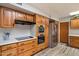 Well-equipped kitchen features stainless steel appliances, cooktop, oven, and plenty of cabinet space for storage at 601 E Winter Dr, Phoenix, AZ 85020