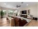 Inviting living room with hardwood floors, modern furnishings, and large windows at 6209 E Bramble Berry Ln, Cave Creek, AZ 85331