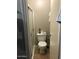 Bathroom with toilet, shower with sliding glass doors, neutral paint and ceramic tile flooring at 623 W Guadalupe Rd # 214, Mesa, AZ 85210