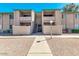 Cozy apartment complex showcasing its well-maintained exterior, with a nice walkway and stairs to the upper units at 623 W Guadalupe Rd # 214, Mesa, AZ 85210