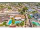 Beautiful aerial shot of a neighborhood, featuring a home with a private pool and well-maintained backyard at 6608 S Willow Dr, Tempe, AZ 85283