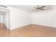 Bedroom featuring laminate wood floors and a ceiling fan at 6608 S Willow Dr, Tempe, AZ 85283