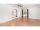 Bedroom with hard floors, adjacent bathroom and patio door entrance at 6608 S Willow Dr, Tempe, AZ 85283