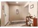 An elegant foyer with tile flooring, a decorative rug, and stylish accents, offering a warm welcome at 6608 S Willow Dr, Tempe, AZ 85283