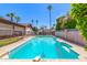 Beautiful fenced pool and lush landscaping create a private oasis in the backyard at 6608 S Willow Dr, Tempe, AZ 85283