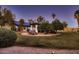 Expansive backyard showcases lush desert landscaping, creating a private outdoor oasis for relaxation and entertainment at 8755 E Gary Rd, Scottsdale, AZ 85260