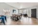 Inviting dining area featuring a rustic table, bench seating, and modern decor in a light-filled space at 8755 E Gary Rd, Scottsdale, AZ 85260