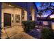 Inviting front porch features modern columns and a seating area framed by manicured bushes, offering an appealing entrance at 8755 E Gary Rd, Scottsdale, AZ 85260