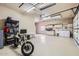The expansive garage is equipped with storage, workspace, laundry area, and ample room for vehicles and projects at 8755 E Gary Rd, Scottsdale, AZ 85260