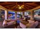 Charming gazebo with comfortable seating overlooking a serene pool and landscaped backyard at 8755 E Gary Rd, Scottsdale, AZ 85260