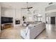 Bright living room with a fireplace, TV, and sectional couch at 8755 E Gary Rd, Scottsdale, AZ 85260