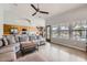 Bright and open living room with access to backyard views and an open kitchen space at 8755 E Gary Rd, Scottsdale, AZ 85260