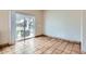 Living space features tiled floors and a sliding glass door leading to an outdoor patio with seating at 8755 E Gary Rd, Scottsdale, AZ 85260