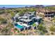 Aerial view showcasing the home's pool, patio, and well-manicured surroundings at 9127 N Fireridge Trl, Fountain Hills, AZ 85268