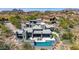 A bird's-eye view of a luxurious home featuring a pool, patio, and spacious layout at 9127 N Fireridge Trl, Fountain Hills, AZ 85268
