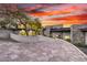 Stunning home featuring stone accents, a glass garage door, and desert landscaping at 9127 N Fireridge Trl, Fountain Hills, AZ 85268