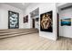 Elegant foyer with hardwood flooring, modern art, and a contemporary aesthetic at 9127 N Fireridge Trl, Fountain Hills, AZ 85268