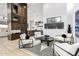 Spacious living room with modern decor, a fireplace, and an open floor plan at 9127 N Fireridge Trl, Fountain Hills, AZ 85268