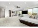 Large main bedroom with neutral decor, a ceiling fan, and a desk at 9127 N Fireridge Trl, Fountain Hills, AZ 85268